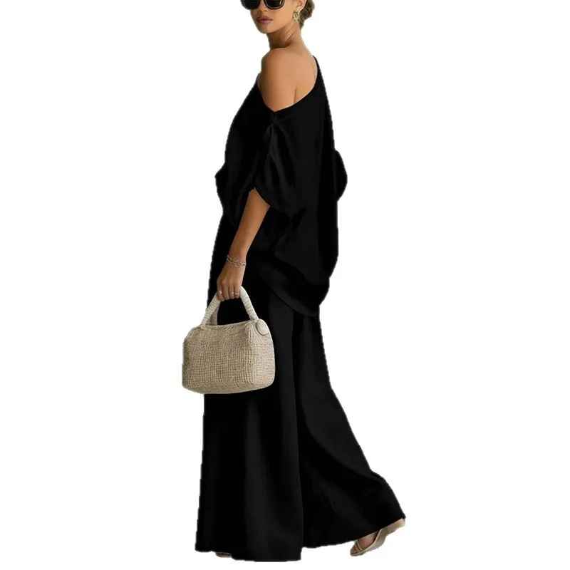 Lisa | Top suave con hombros descubiertos y pantalones tapered