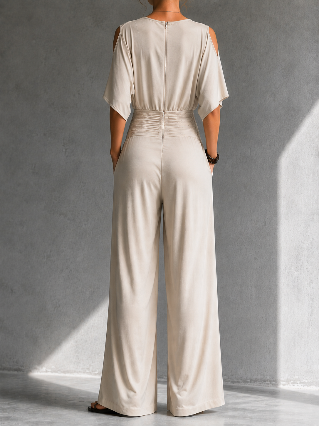 Alia | Mono elegante con efecto cruzado y pernera ancha