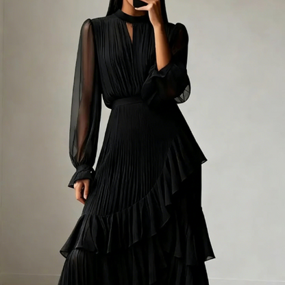 Elegante vestido midi plisado con volantes.