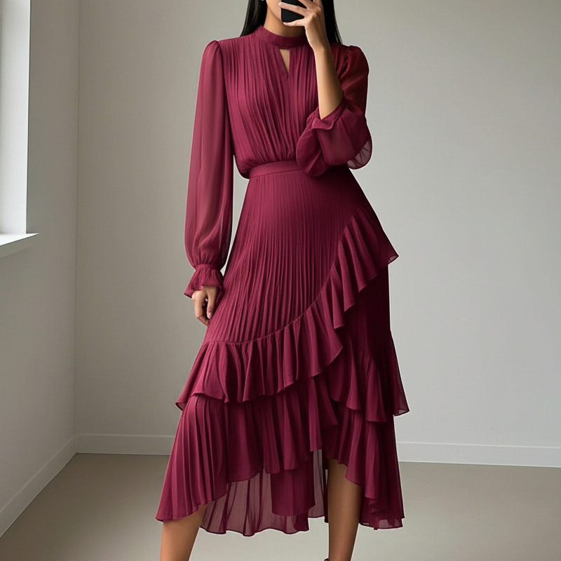Elegante vestido midi plisado con volantes.